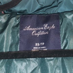 Green puffy jacket worn once